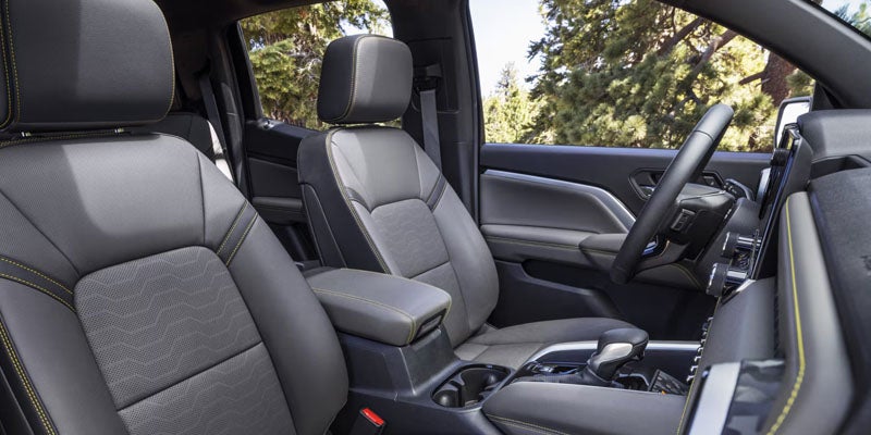 2026 Chevrolet Colorado interior in St. Clairsville, OH, showcasing durable materials, spacious seating for 5, StowFlex® storage, and an easy-to-use digital driver interface.