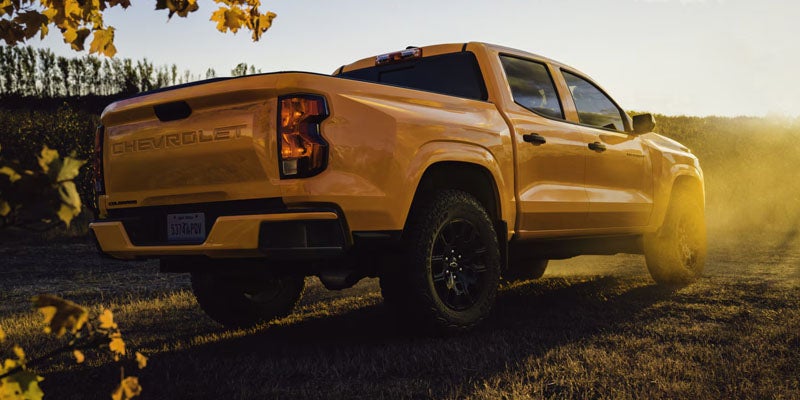 2026 Chevrolet Colorado truck bed in St. Clairsville, OH, equipped with durable materials, tie-downs, and EZ Lift tailgate, perfect for hauling and outdoor adventures.